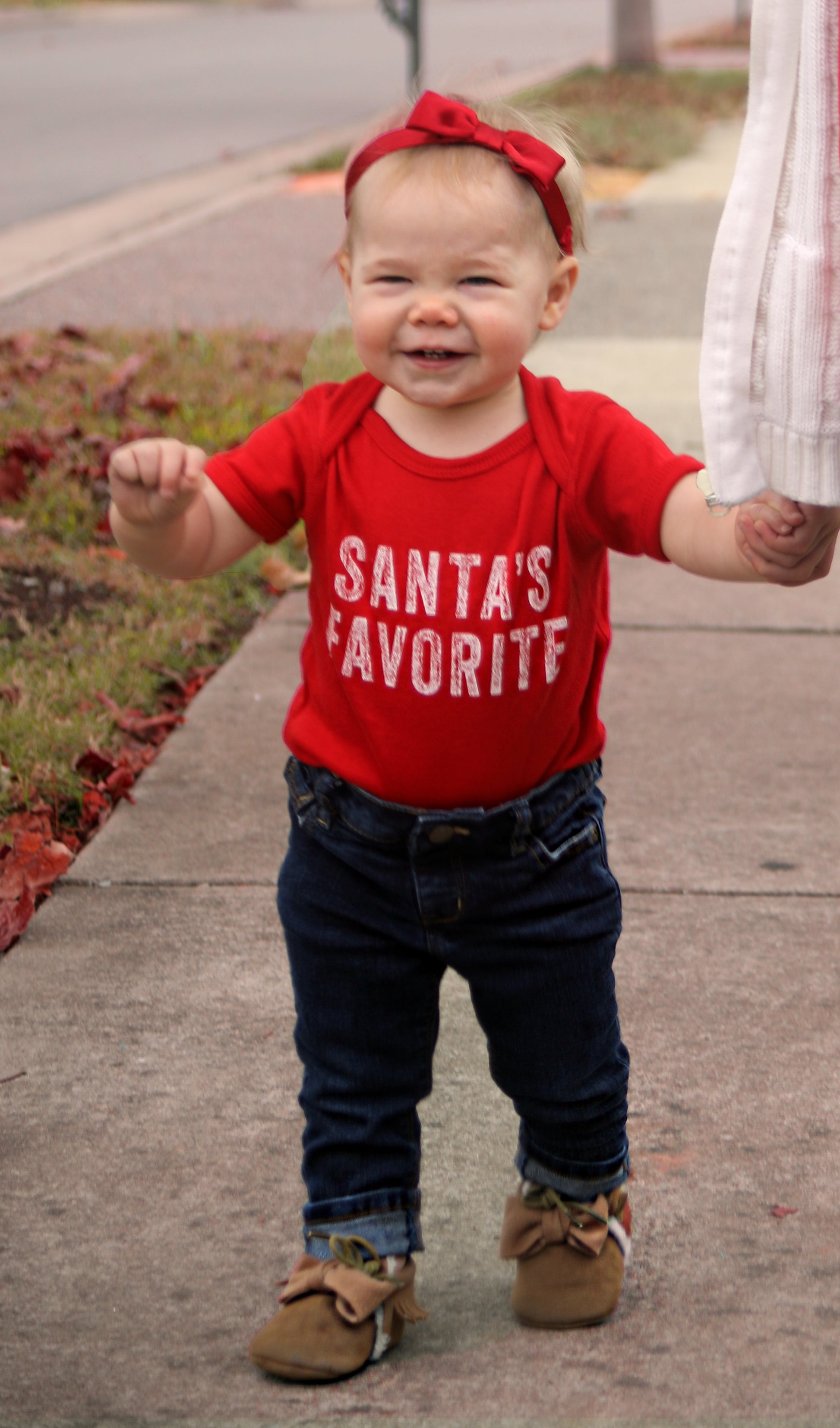 Riley is wearing 12mo.