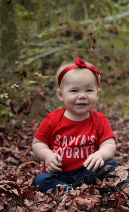 Riley is wearing 12mo.